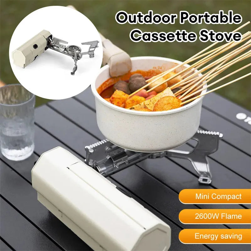 Green folding camping gas stove with storage bag showing compact 25cm size