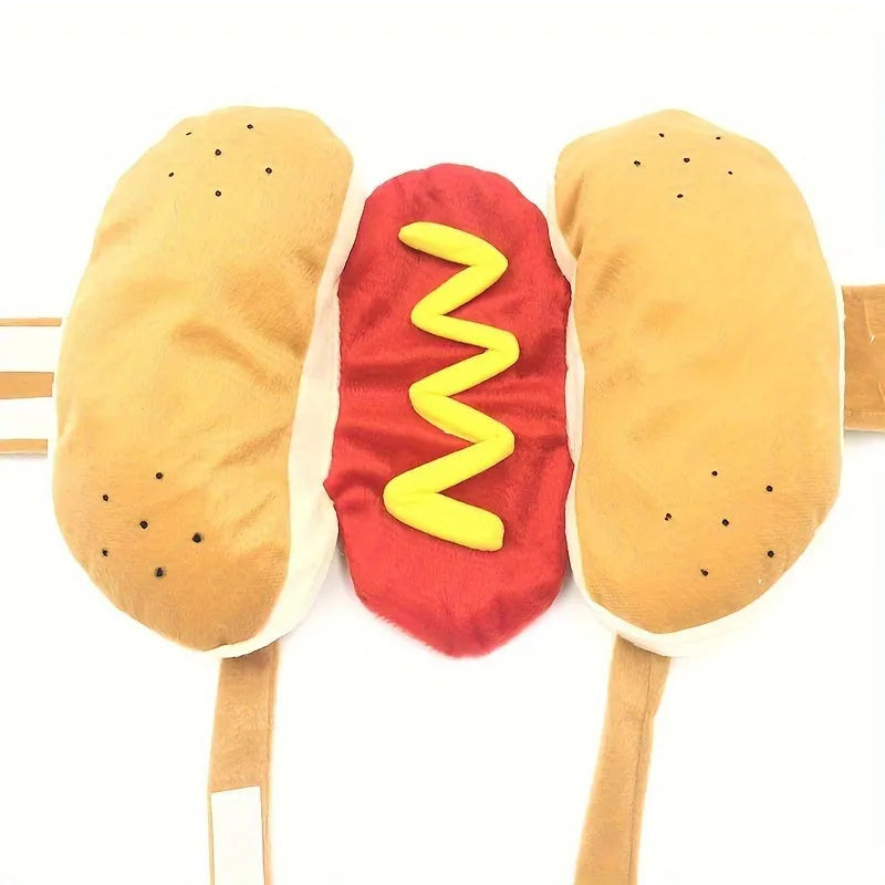 Brown and beige hot dog costume on a small dog, showing plush bun, sausage, and fabric mustard and ketchup toppings.