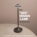 Creative UFO-shaped rechargeable table lamp with metal base in black, gold, or grey colour.