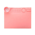 Light blue silicone painting mat with two built-in bowls, sized 50 by 40 centimetres.