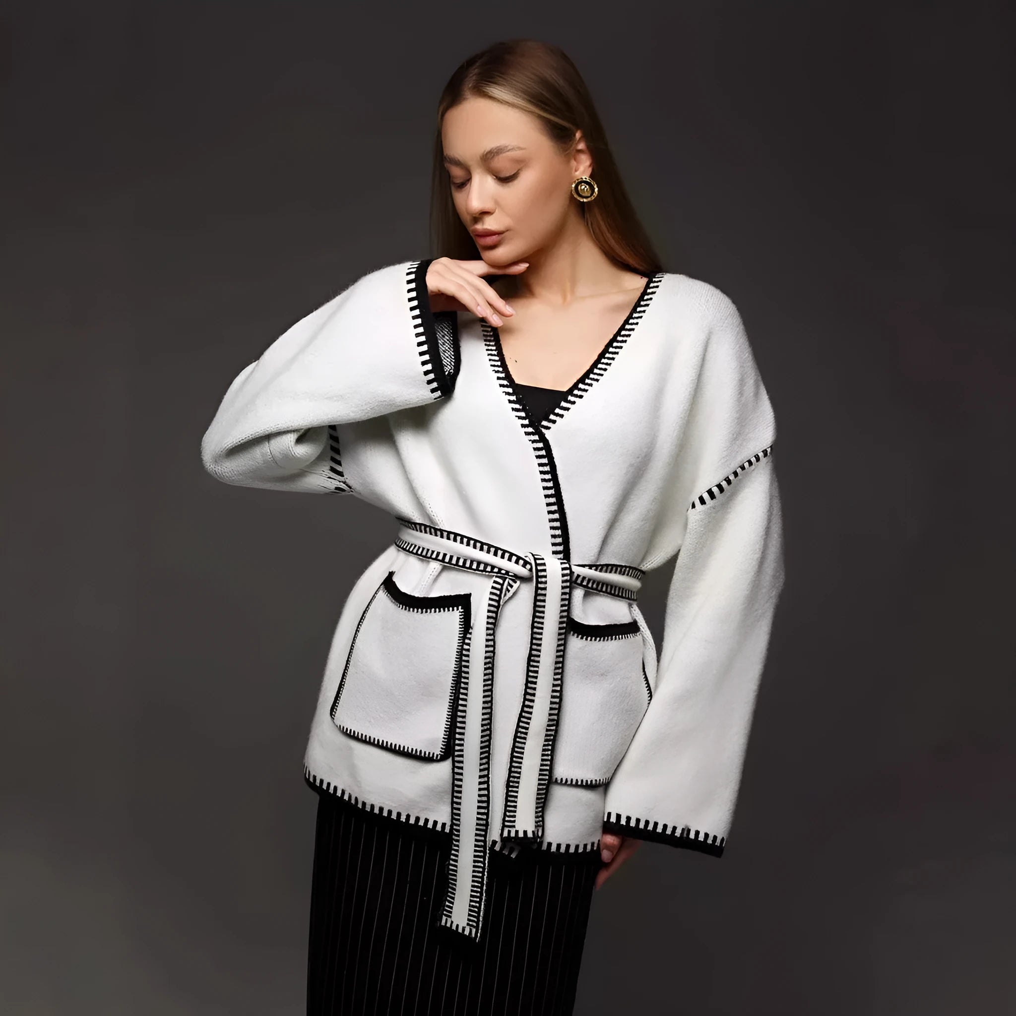 Lace-up front knitted cardigan in a thick imitation cashmere blend, shown in camel colour