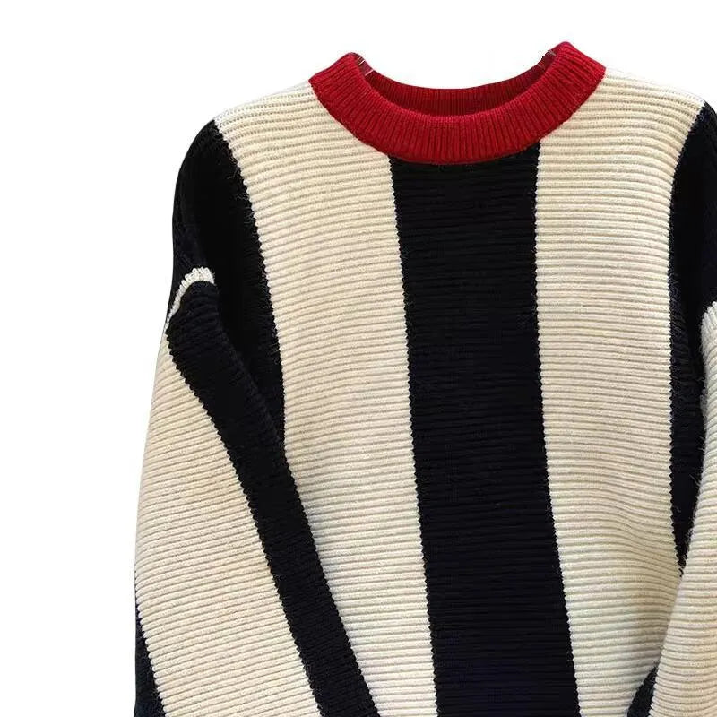 Women's striped round neck cashmere pullover sweater with contrast colour detail.
