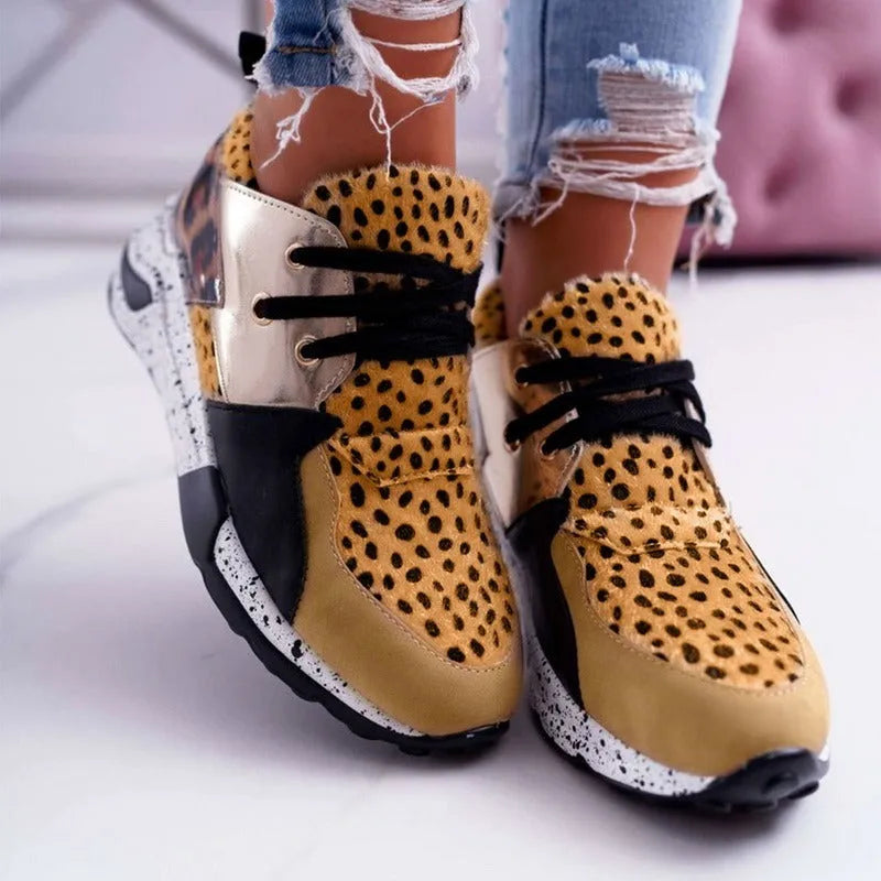 Women's suede flat sneakers with a wedge heel in black, leopard, pink, panther, and snake pattern colour options