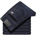 Stretch denim jeans in loose plus size with straight leg and mid waist design