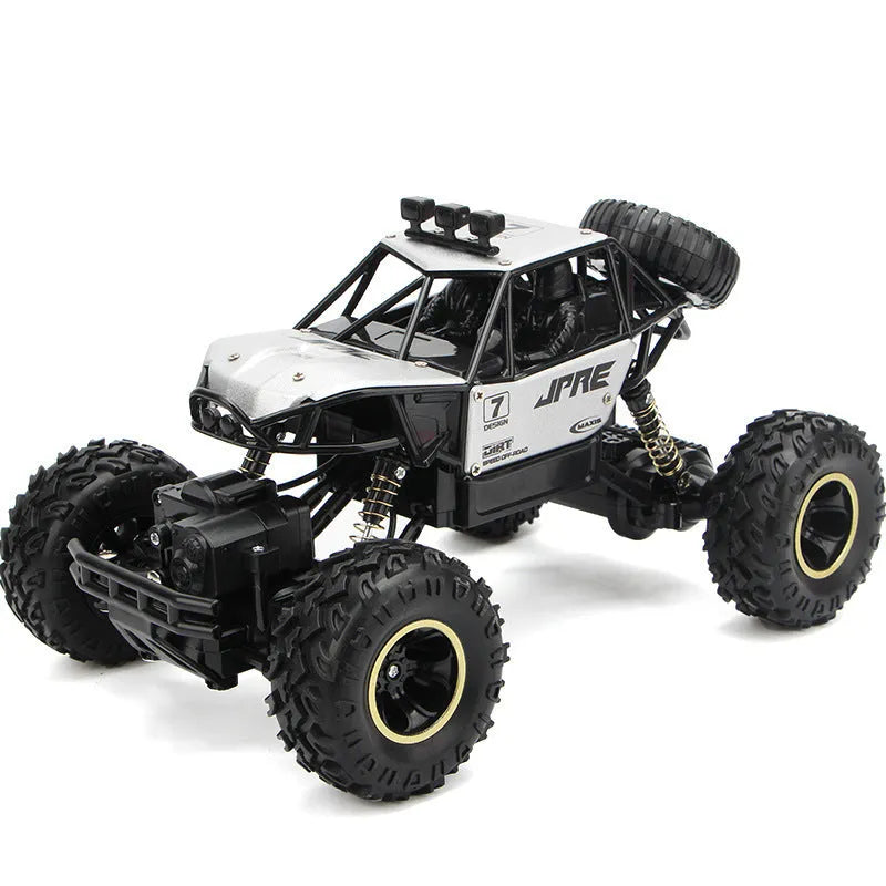 Large black 4WD remote control climbing car and a smaller silver high-speed RC car with wireless remotes