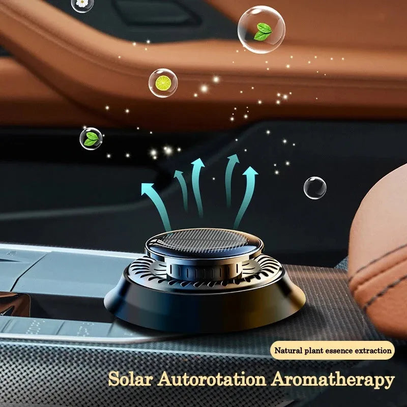 Solar-powered kinetic car air freshener with rotating double rings and wooden fragrance inserts