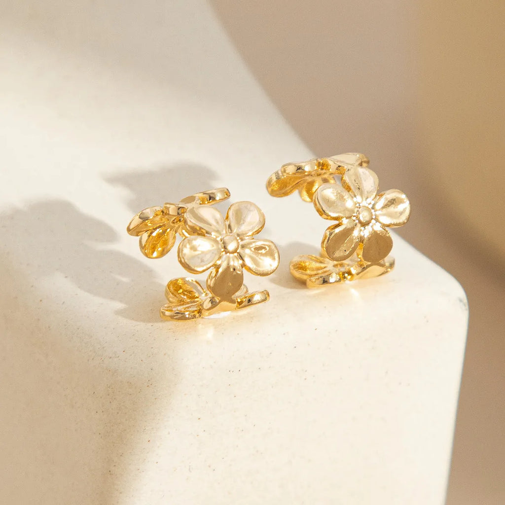 Gold electroplated alloy starfish conch shell drop earrings for women