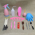 14-piece succulent gardening tool set showing watering can, tweezers, mini shovels, rake, and scissors on a table.