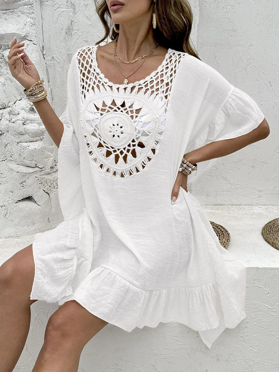 Textured crochet-style patchwork skirt dress in slubbed fabric shown as a beach cover-up.