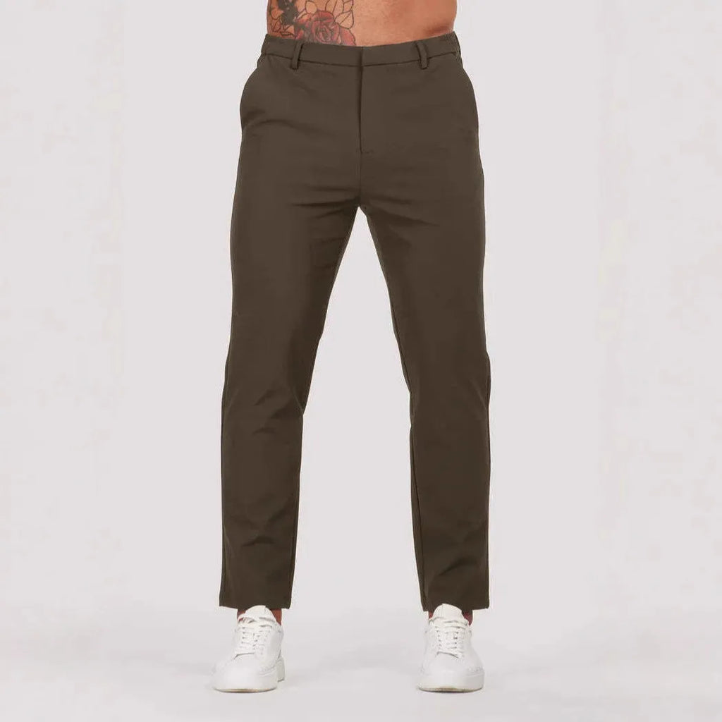 Men's solid colour suit trousers in mid waist, straight leg, small feet opening, polyester blend, available in five colours.