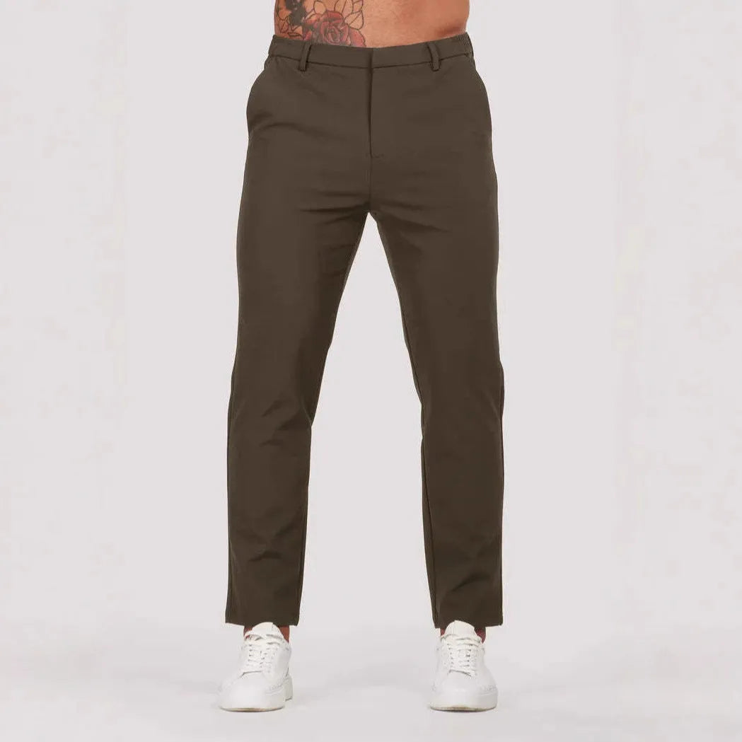 Men's solid colour suit trousers in mid waist, straight leg, small feet opening, polyester blend, available in five colours.