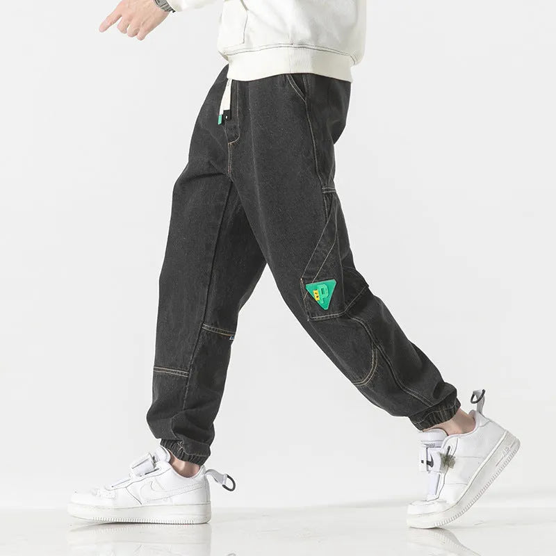 Men's cotton loose fit tapered trousers in black, blue, or grey colours with mid waist design