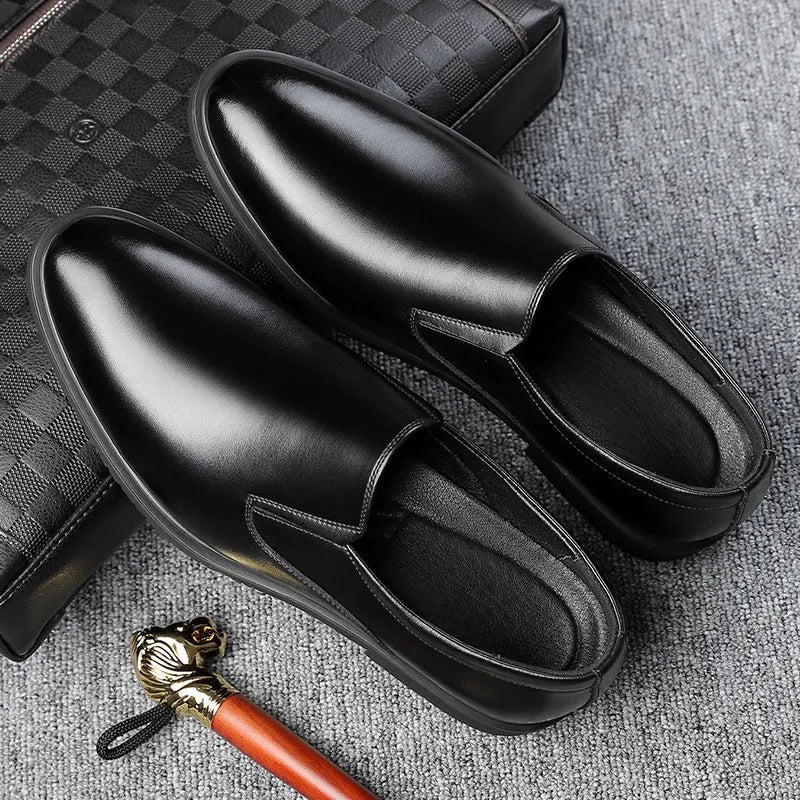 Men's black business casual slip-on shoes with leather uppers and rubber soles