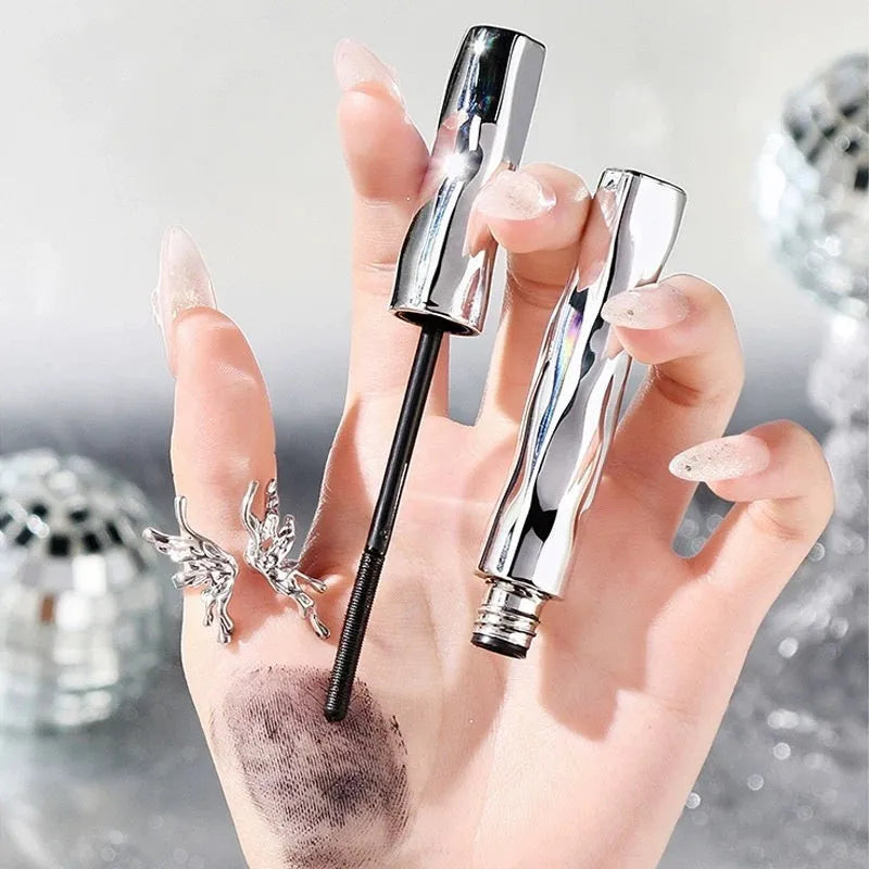 Black and brown waterproof steel tube mascara with optional eyelash curler.