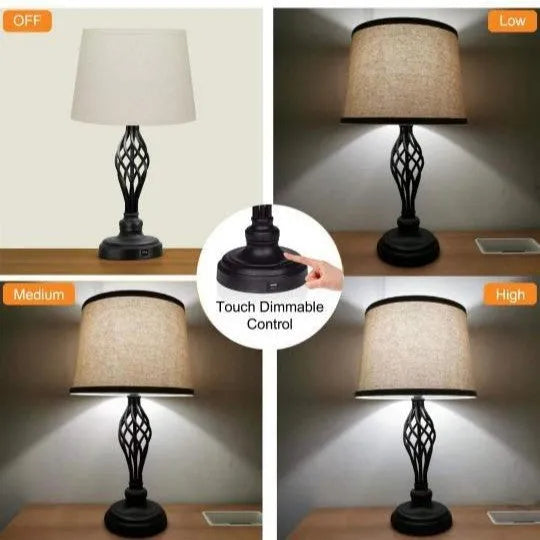 Modern alloy metal touch control bedside table lamp with USB port on a wooden surface.