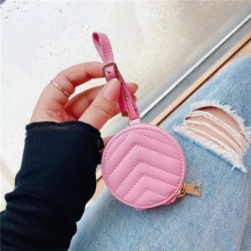 Wallet-style Bluetooth headset protective case with zipper and imitation leather finish in green, pink, red, purple, or black.