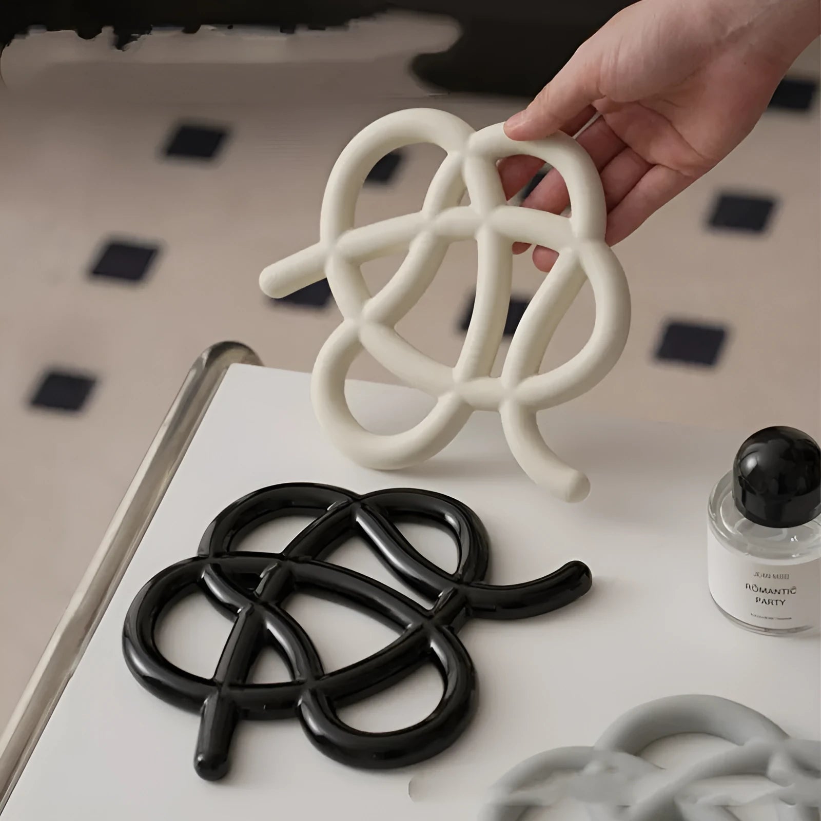 Ceramic heat proof mat with irregular shape on dining table