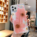 Flower pattern iPhone case in pink or yellow colours with floral design on TPU back cover