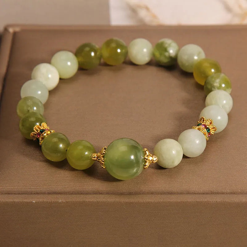 Women's original design jade bracelet in Xiuyan green colour with mori style aesthetic