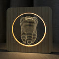 Tooth-shaped wood colour acrylic night lamp with USB cable on white background