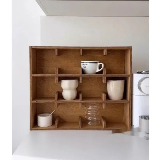 Square solid birch wood cup storage rack with multiple grid compartments in a natural meridian colour.