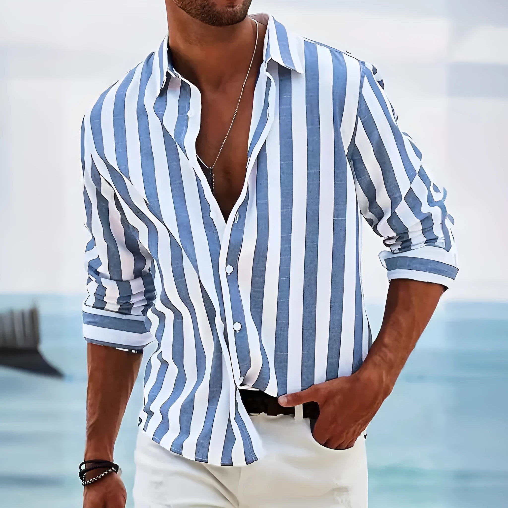 Man wearing loose-fitting striped long-sleeved shirt in polyester fabric with British casual style