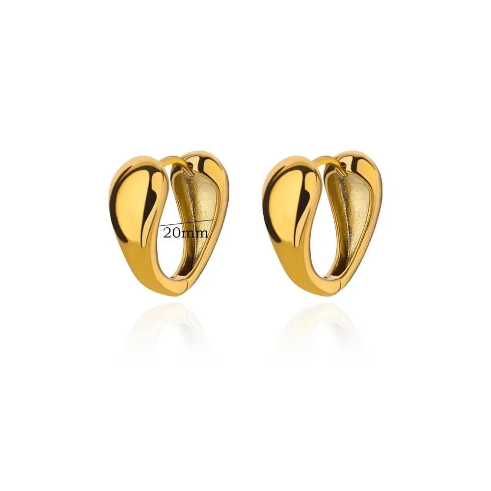 Women's copper butterfly earrings with geometric heart, star, and bow shapes in assorted colours.