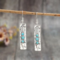 Silver geometric women's earrings with long strip design and inlaid turquoise detailing