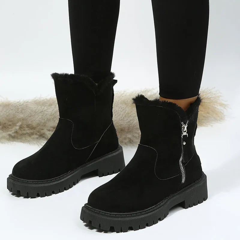 Women's black high-top snow boots with side zipper and faux fur lining shown alongside khaki colour option