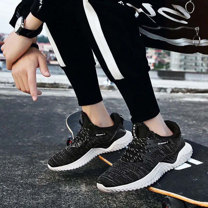Adult unisex low-top running shoes with breathable mesh upper and front strap closure in multiple colour options
