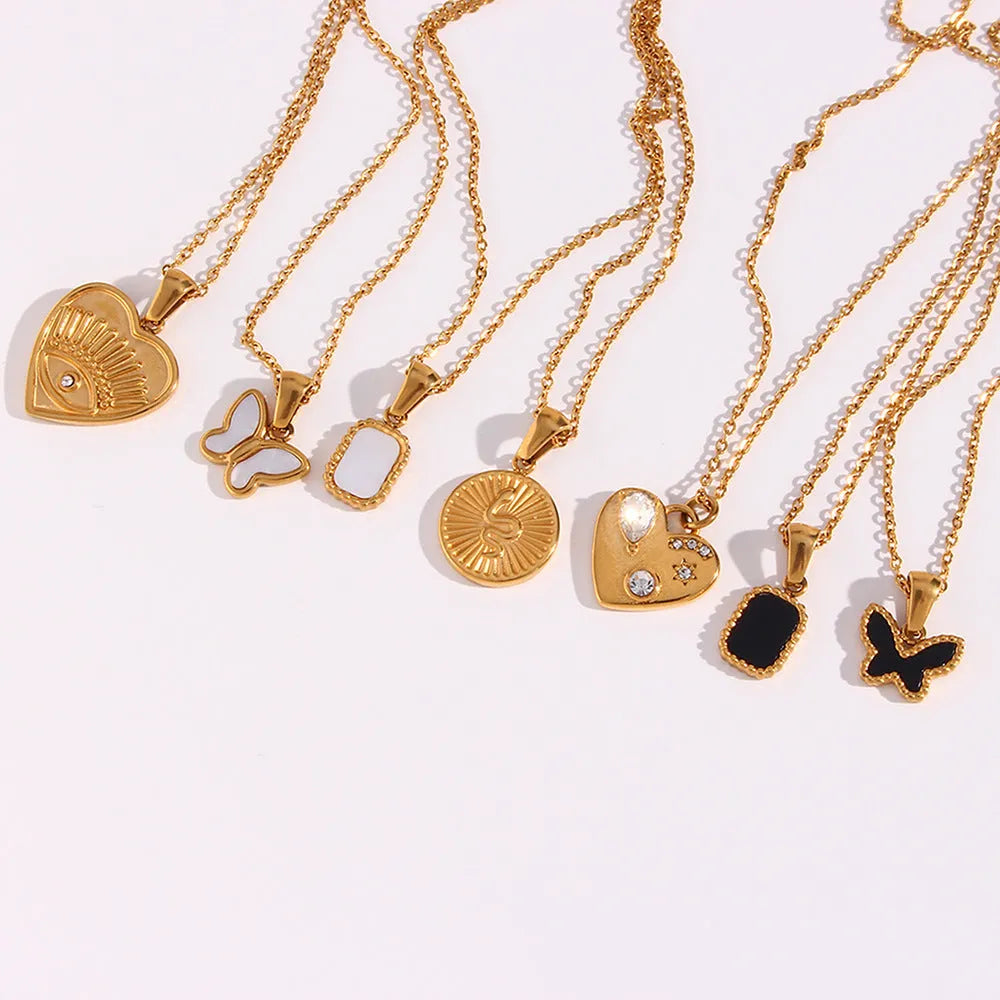 Acrylic butterfly pendant necklace on adjustable stainless steel chain with zircon and shell accents, women's jewellery