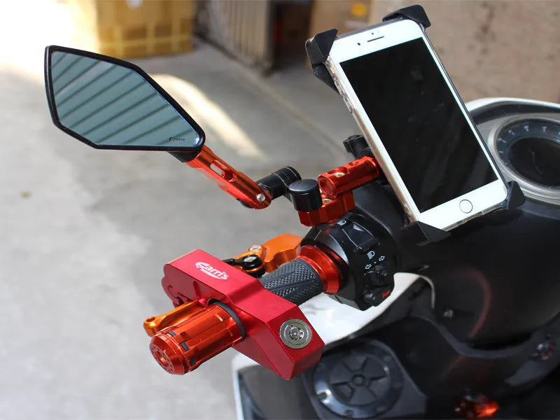 Motorcycle handlebar lock in CNC aluminium alloy, 14.7 cm long, shown in black with two wrenches