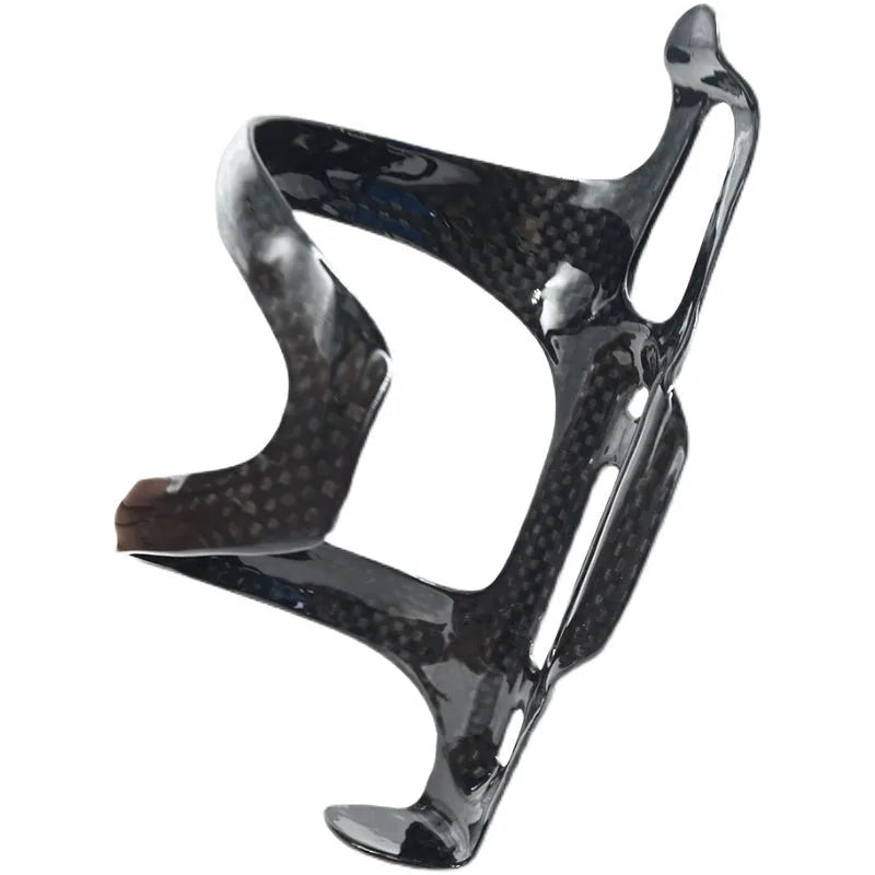 Black carbon fibre side-pull bicycle water bottle cage mounted on a bike frame.