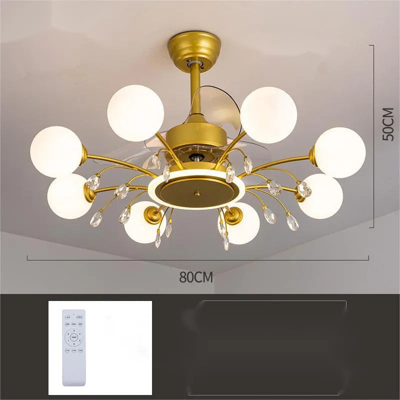 Black and gold ceiling fan light fixture with acrylic shade and metal blades, shown with remote control