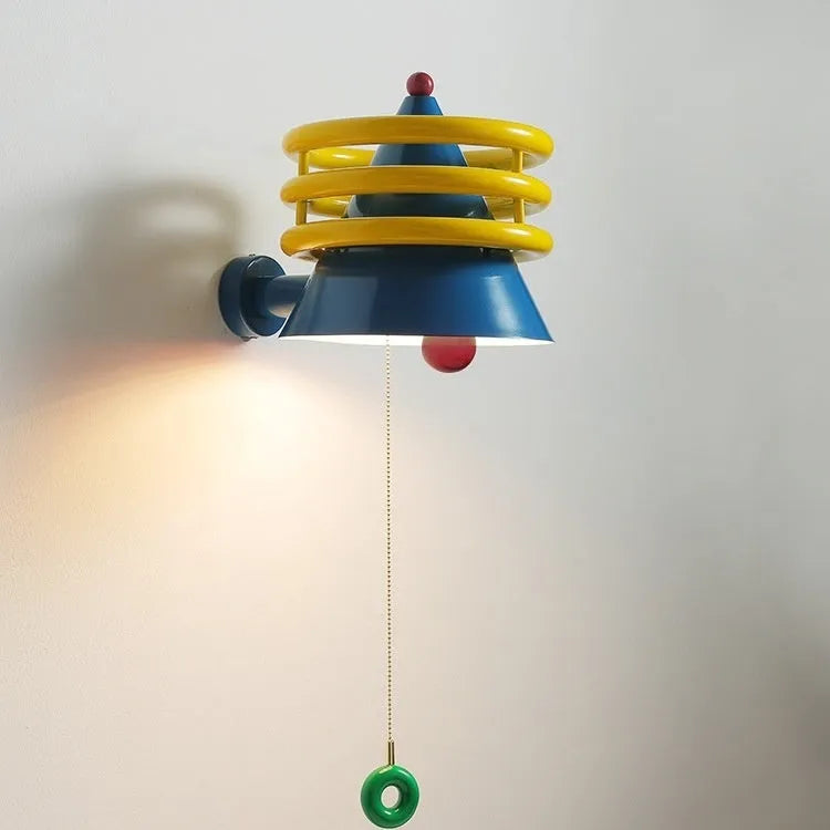 French cream wind belt bedhead wall light 25cm diameter with warm light option on bedroom wall