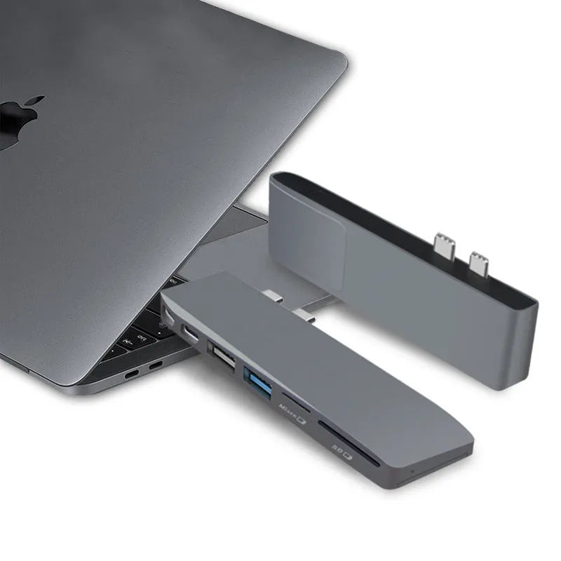 USB-C hub adapter for MacBook Pro with eight interfaces including USB ports and card readers