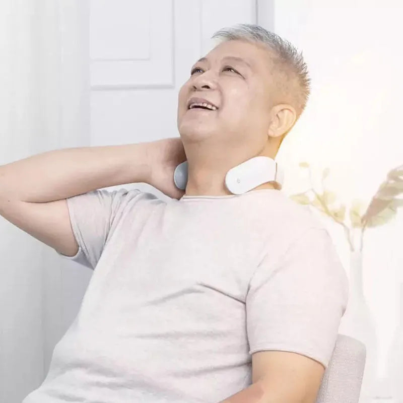 Jeeback G2 white cervical massager, 140mm x 85mm x 148mm, TENS pulse neck and back device with remote control.