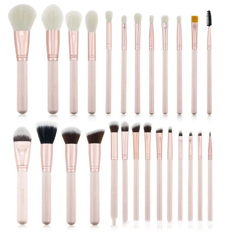 26 pink makeup brushes with wool bristles and wooden handles in storage bag