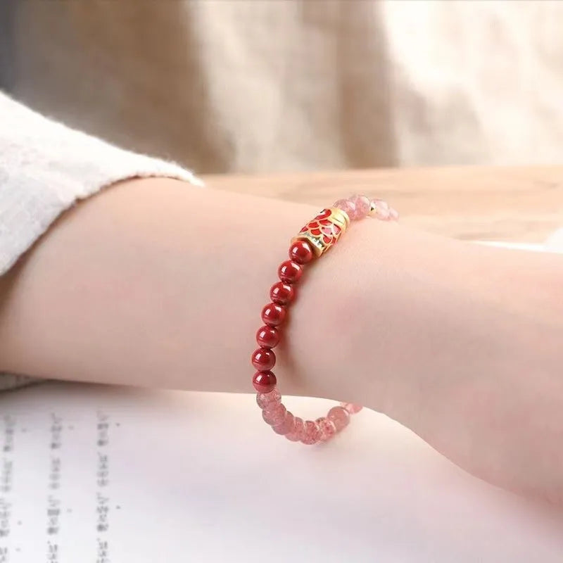 Purple cinnabar and strawberry quartz bracelet with koi and peach blossom lucky bead designs
