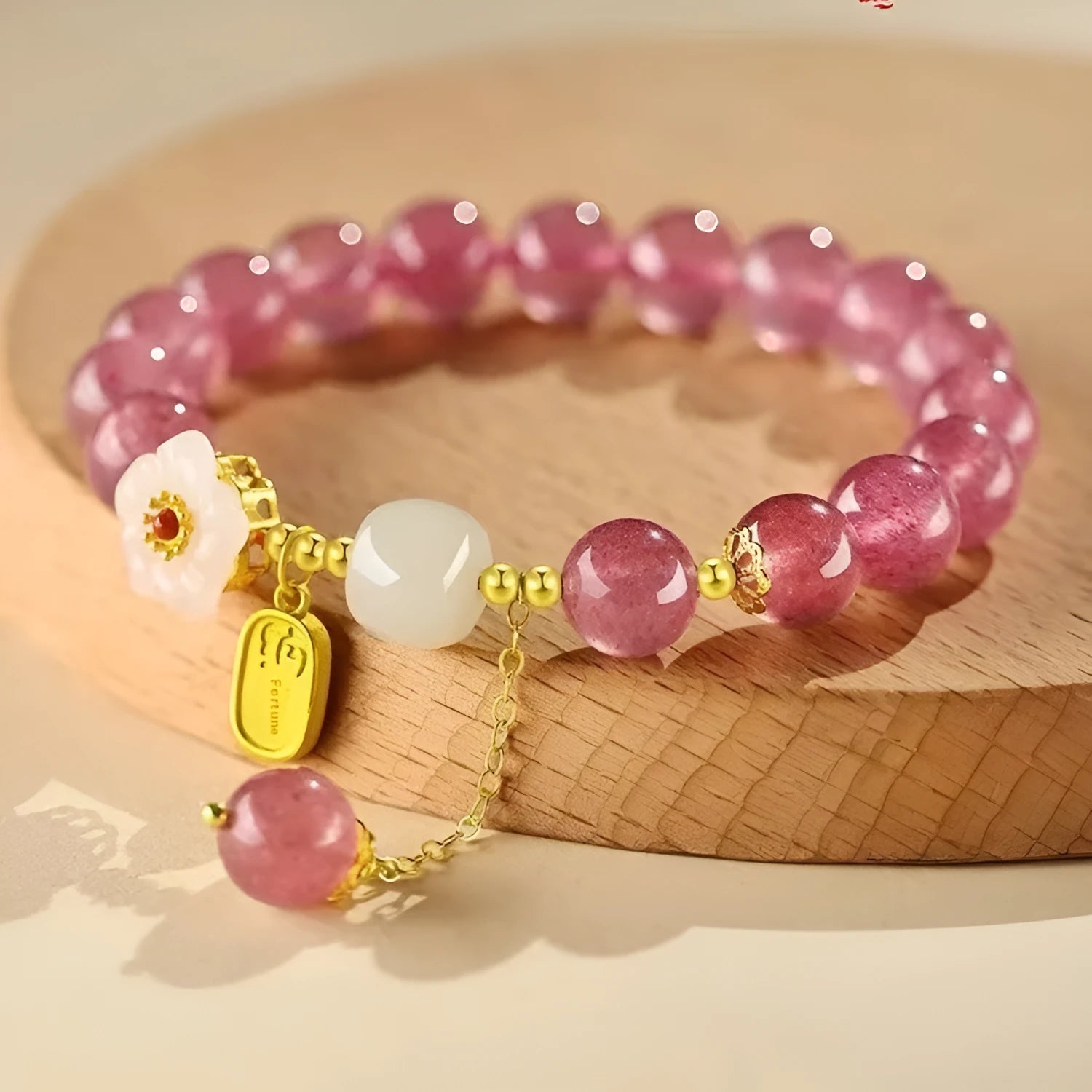 Handmade strawberry quartz crystal bracelet with green crystal moon charms for girls