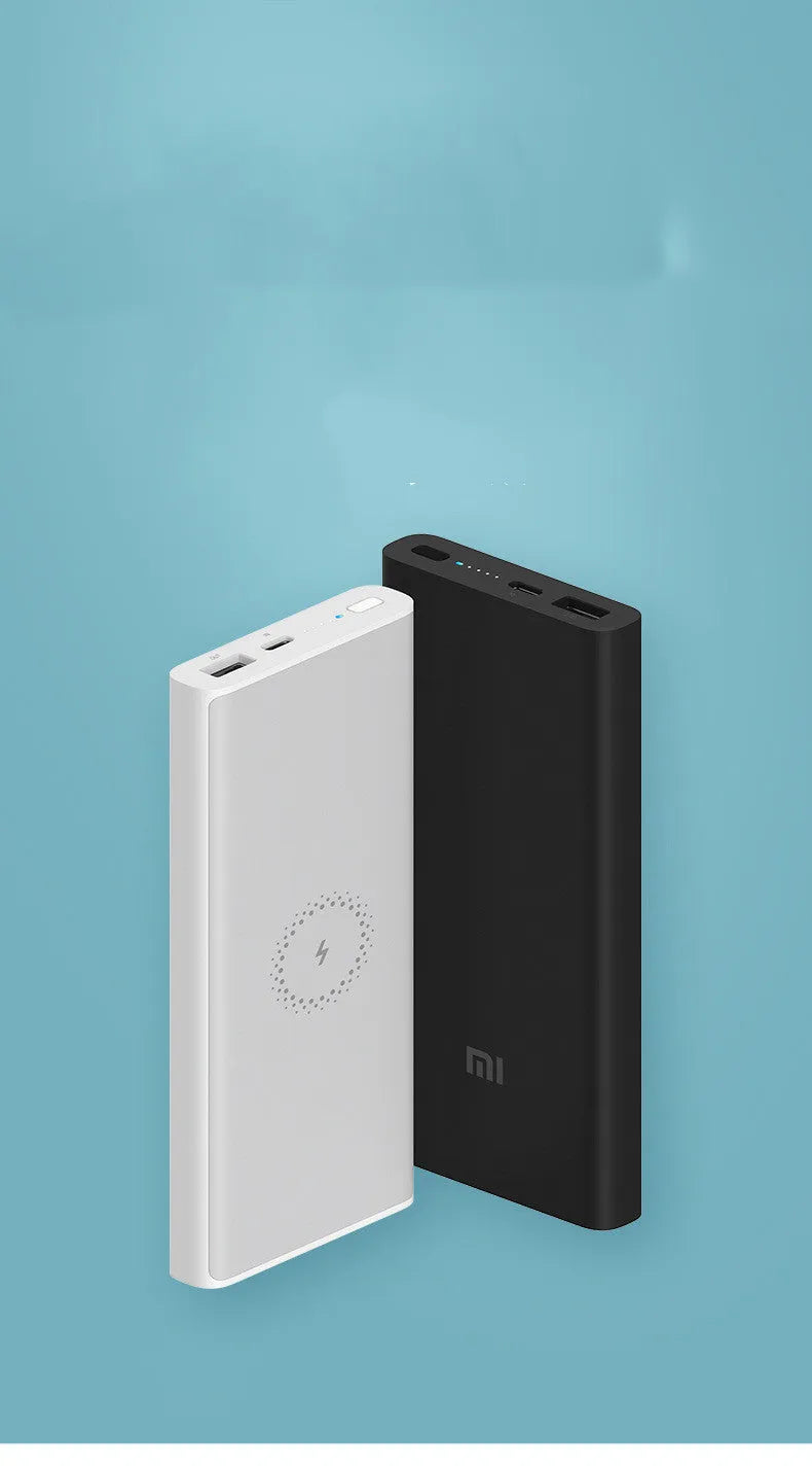 White and black 10000mAh portable power bank with USB-C and USB-A ports for fast and wireless charging.