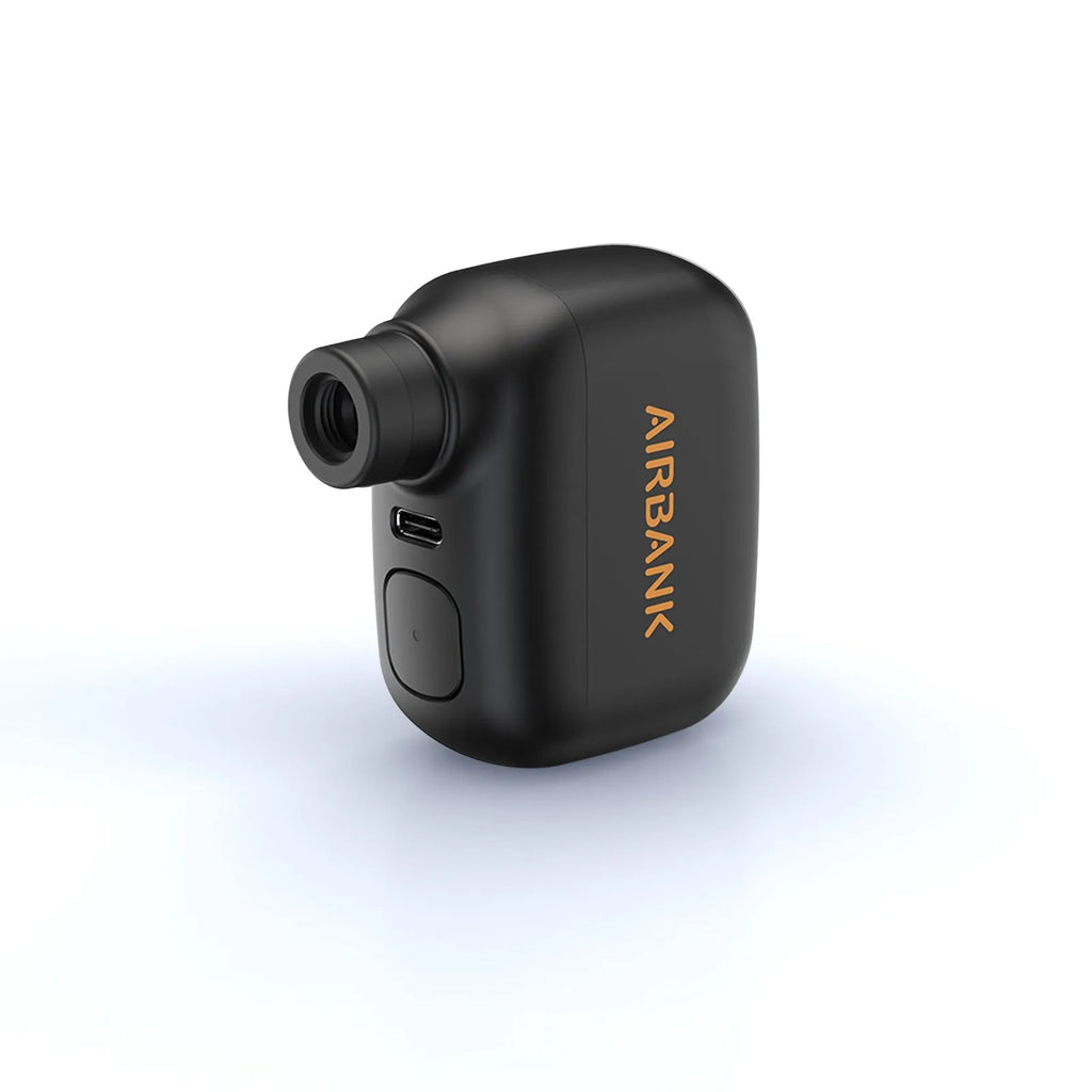 Black plastic USB-rechargeable electric bicycle tyre inflator pump with charging cable and waterproof bag
