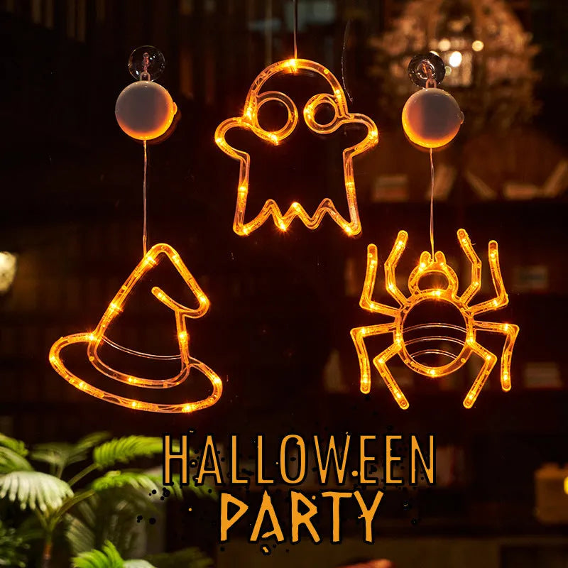 Halloween LED window lights showing spider, pumpkin and ghost designs with suction cup mounting