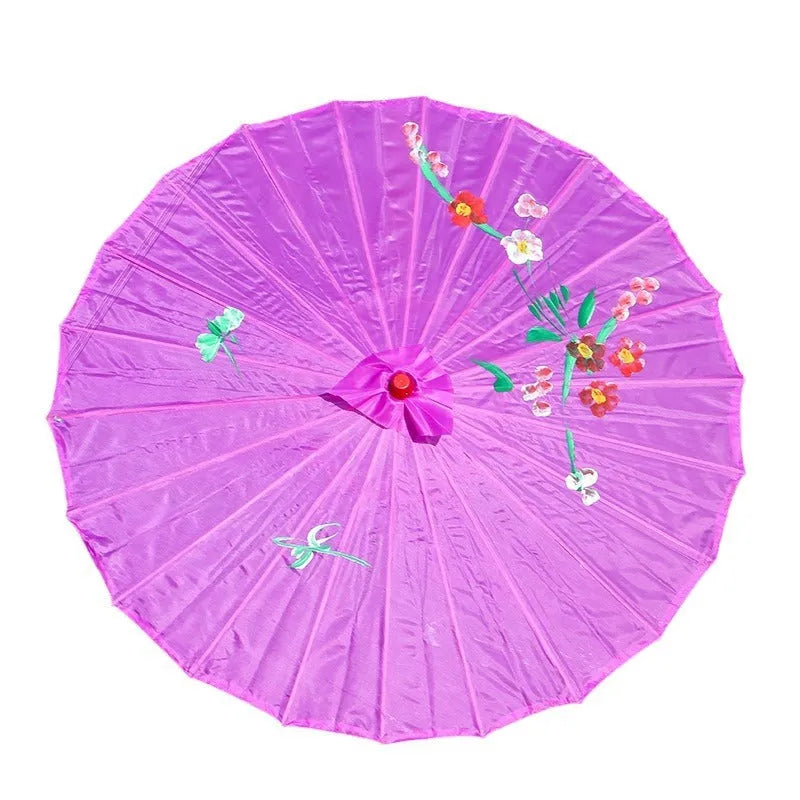 Handmade Chinese-style silk dance umbrella with wooden pole, available in ten colours and four diameters.