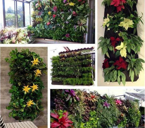 Vertical 7-pocket felt planter bag hanging on a wall with green plants growing from the pockets