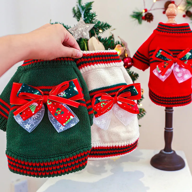 Red and green dog Christmas jumpers showing weight-based sizing from XS to XL for holiday pet wear