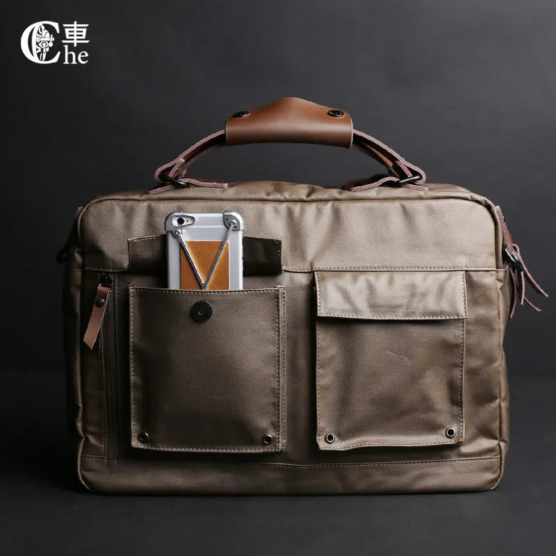 Dpark black men's shoulder bag for 14 or 15 inch laptops on a table