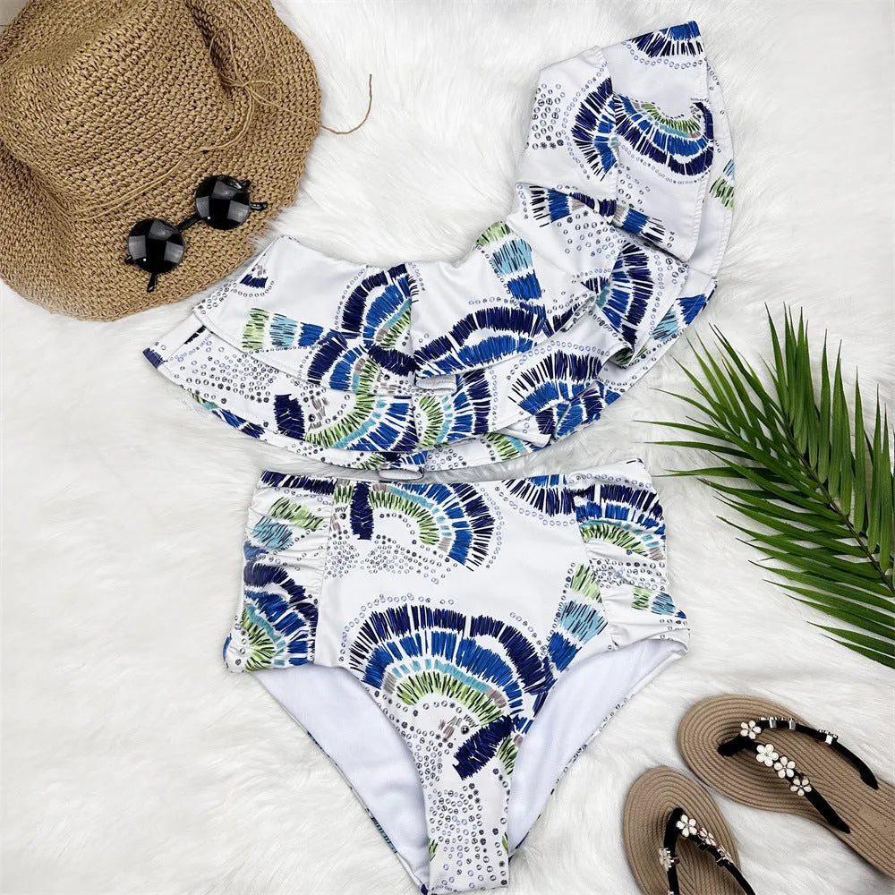 White women's one-shoulder swimsuit with double-layer lotus leaf design and high-leg split