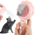 Grey spray cat brush with release button and water spray function on a white background