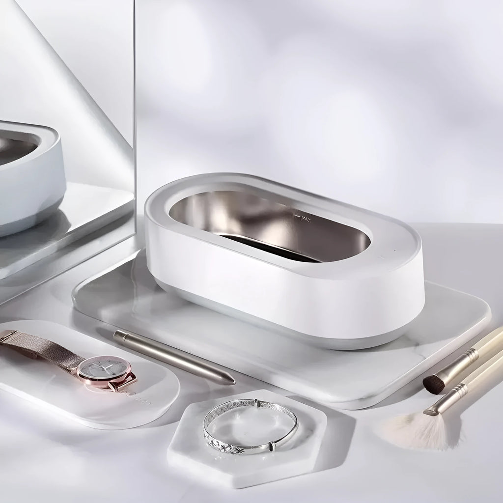 White portable ultrasonic cleaning machine with display and stainless steel tank.
